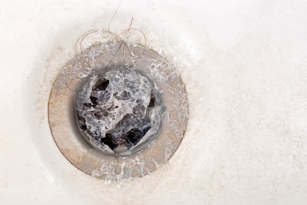 Soap scum in drain St. Louis