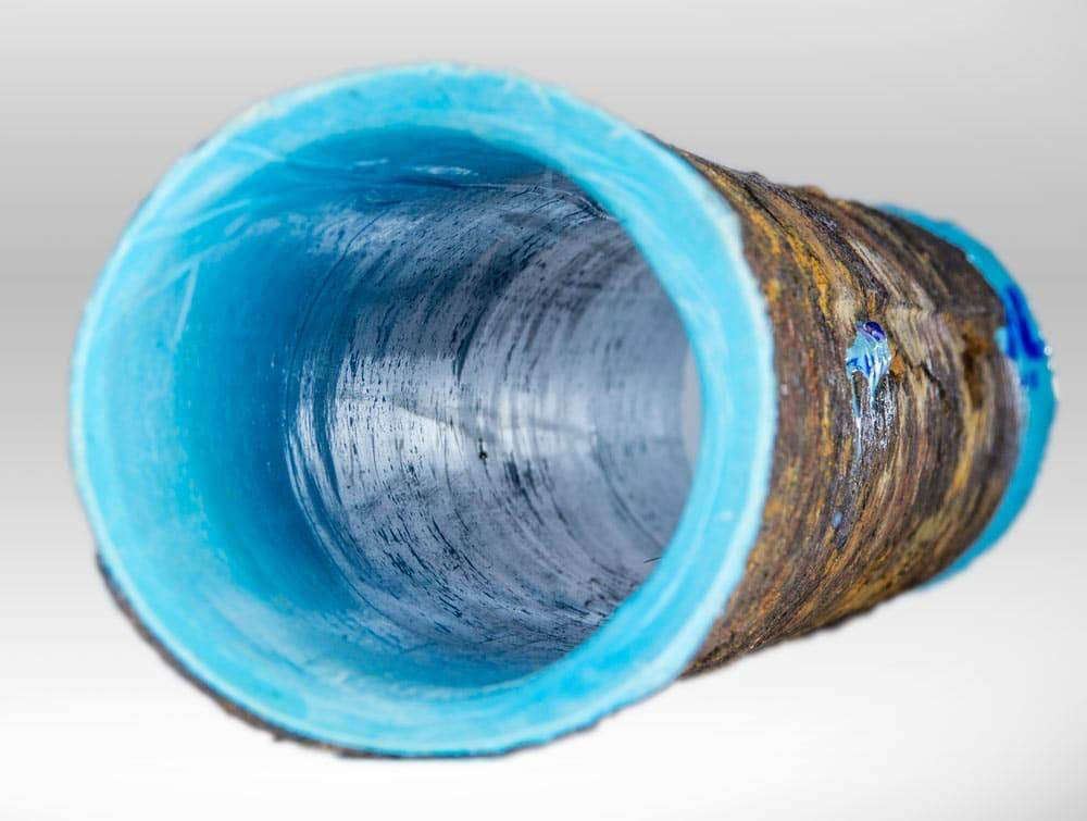 repaired sewer pipe with lining