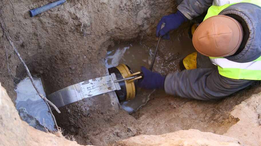 Sewer camera being inserted into a sewer line