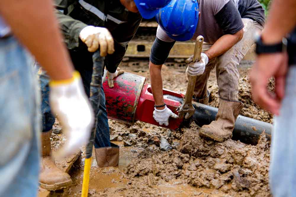 trenchless repair crew