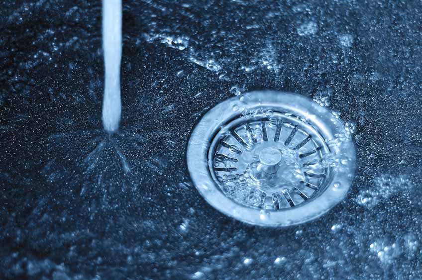 water draining in sink