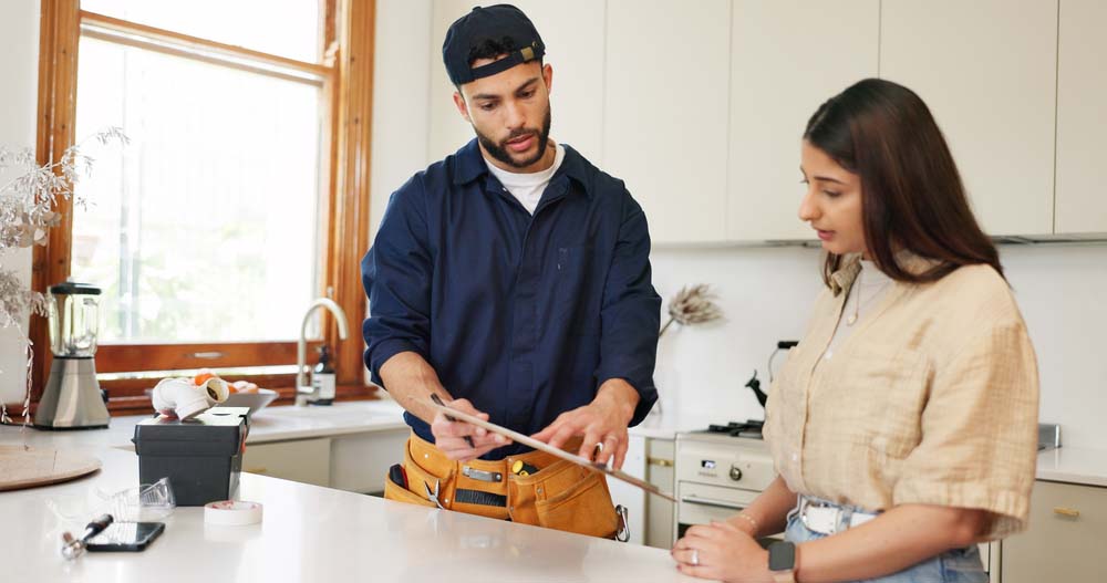 property owner consulting a pipelining tech